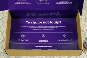 purple plush pillow 100-night trial and 1-year limited warranty on box