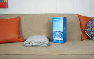 elegear cooling blanket folded on sofa