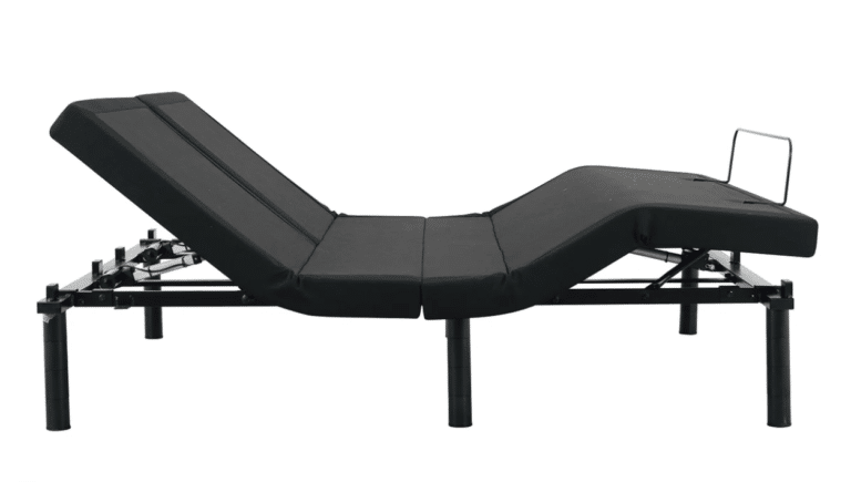 The DUETTO Split Top Adjustable Base is shown in a positional configuration with the head and leg sections raised. Supported by multiple cylindrical legs, it features a simple, sleek design. A metal retainer at the foot end keeps the mattress securely in place.