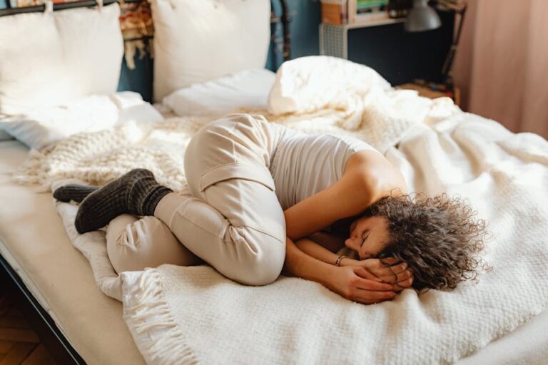 a woman lying on a bed