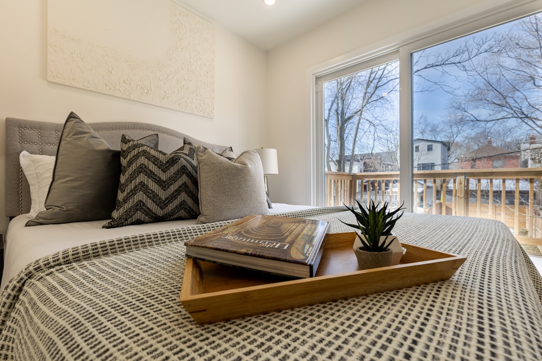 a tray of books on a bed