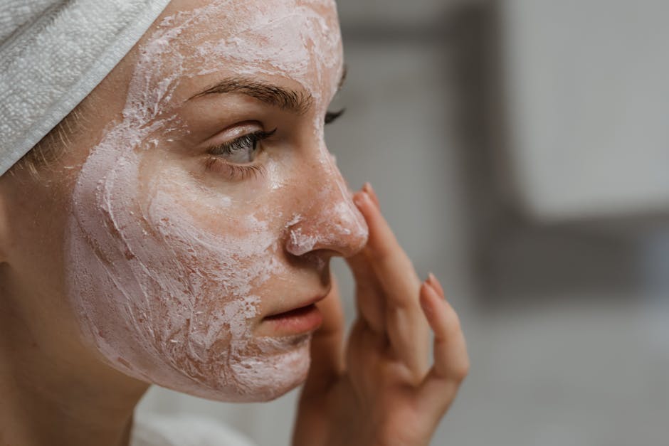 a woman with a white mask on her face