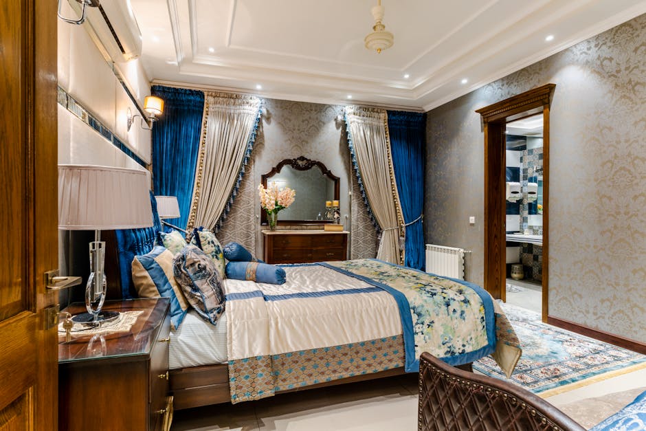 a bedroom with a mirror and a bed