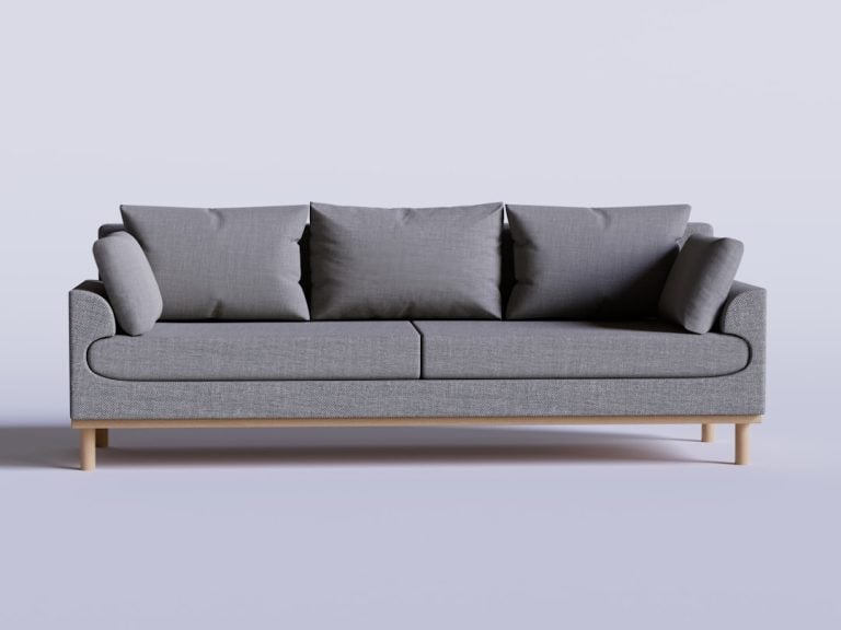 A modern gray sofa with wooden legs against a plain white background. The sofa features a minimalist design with two seat cushions and five backrest cushions, including two cylindrical side cushions.