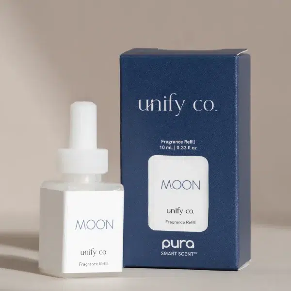 A fragrance refill bottle named "Moon" by Unify Co. is placed beside its matching blue box, which showcases identical branding and information, all set against a neutral background.