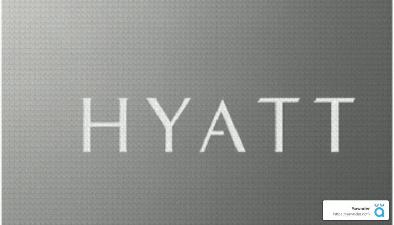 The image shows the word "HYATT" in large white capital letters on a textured gray background.