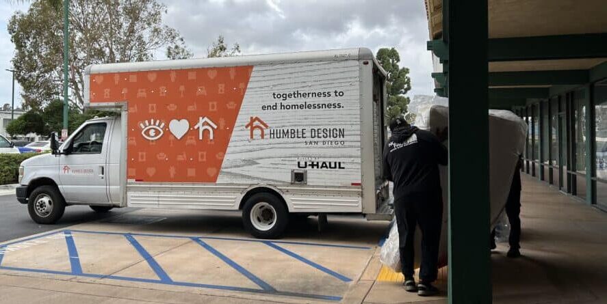 Community 1 Yawnder donation delivery with Humble Design San Diego team in front of a truck