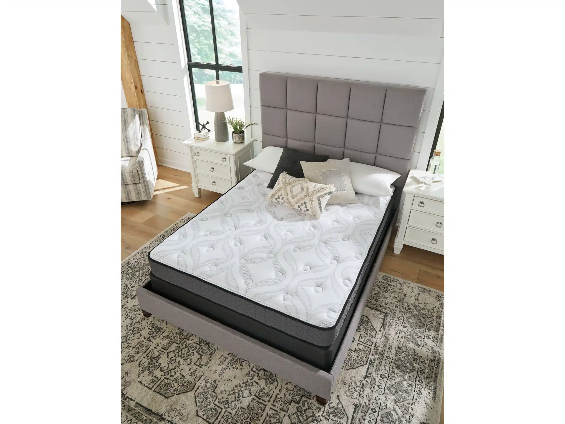 Ashley Chime mattress styled in a bedroom