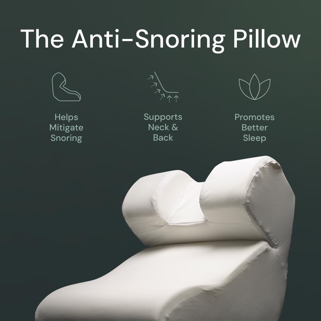 The Snorinator upright pillow on bed