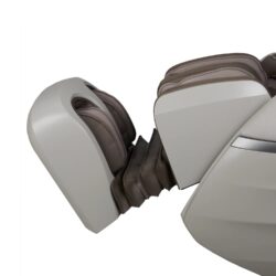 Taupe leg extension of a massage chair with a white and gray exterior