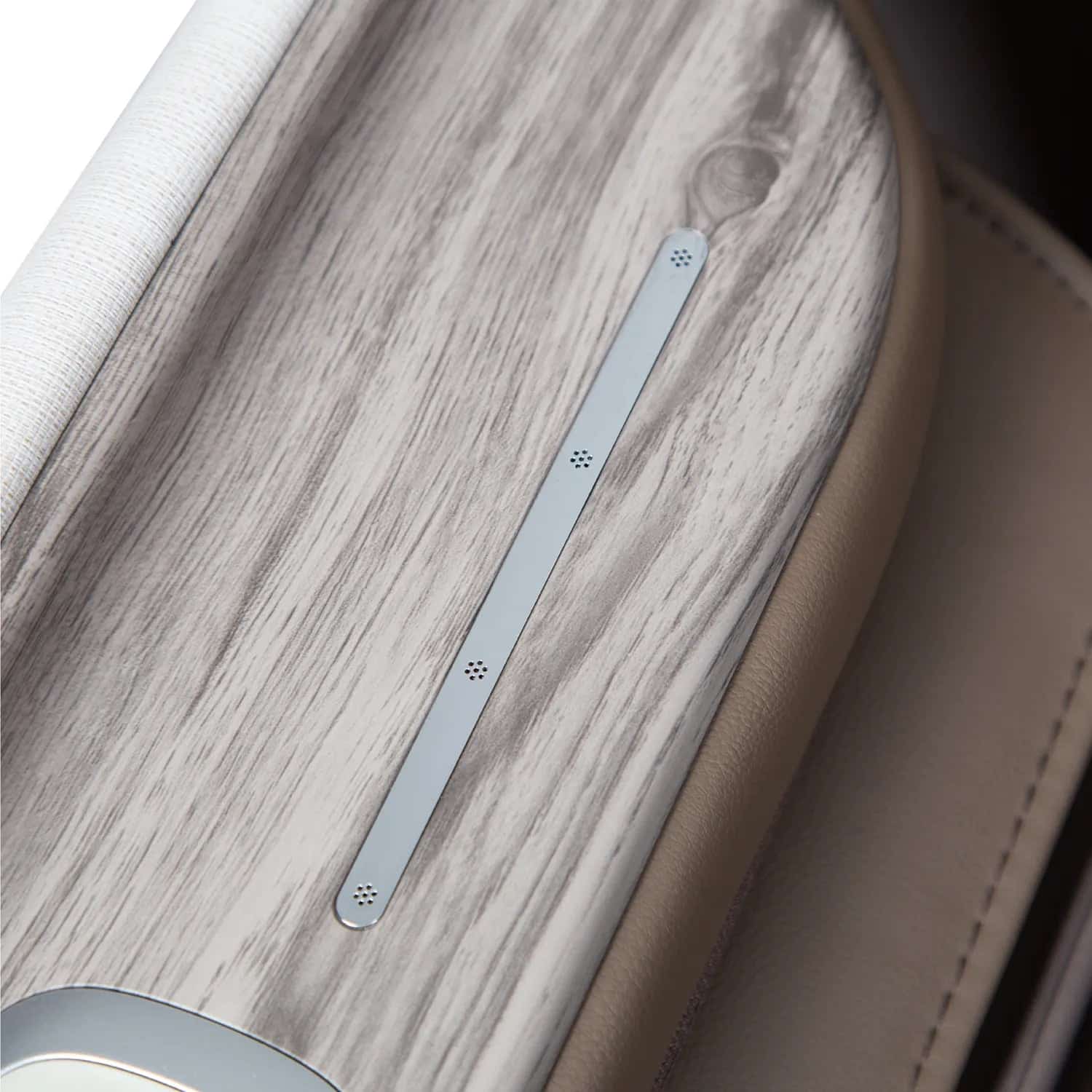 Taupe wood grain panel with controls and an off-white textured edge.