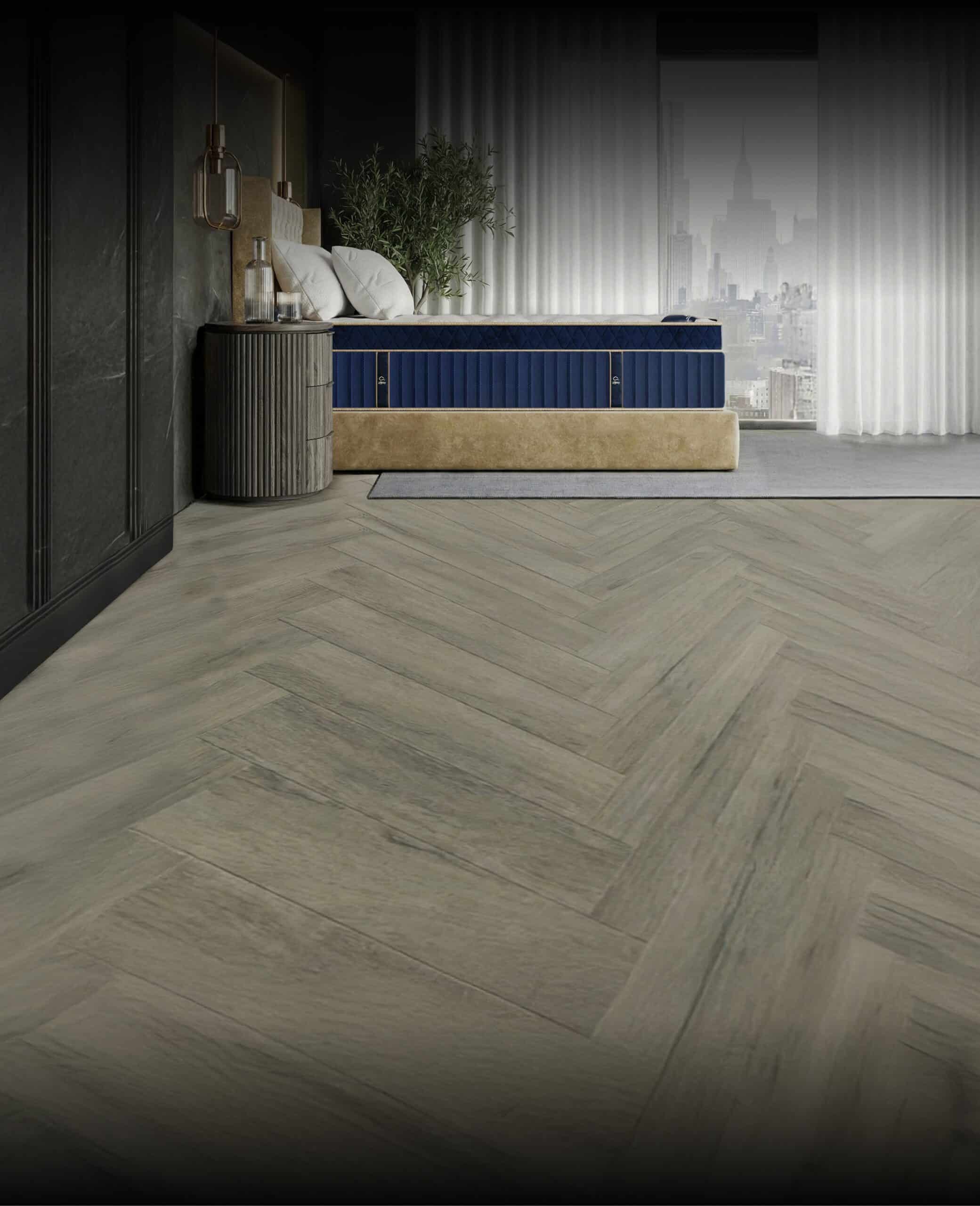 Legacy mattress with a blue quilted top and beige upholstered base in a stylish bedroom