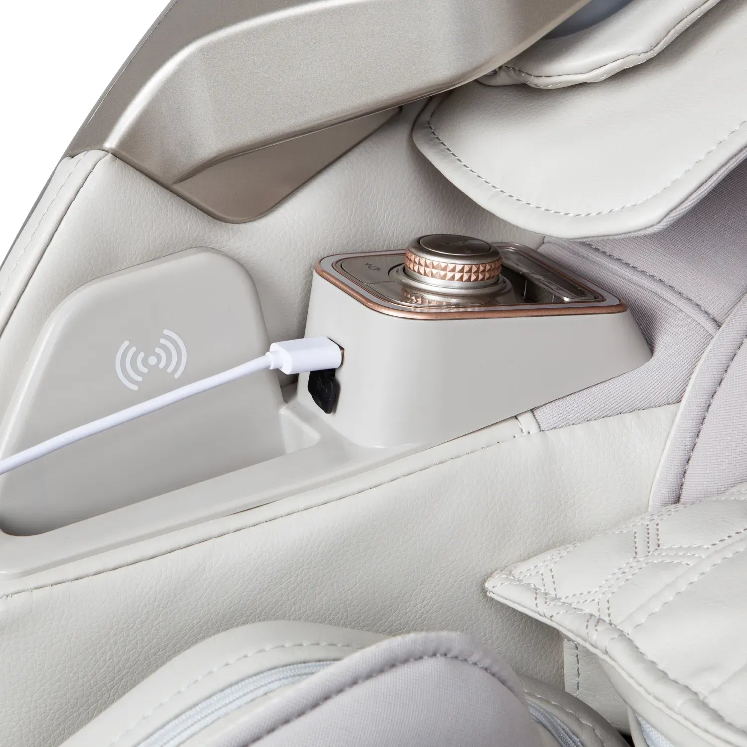 Close-up of a white massage chair with a control panel and charging port