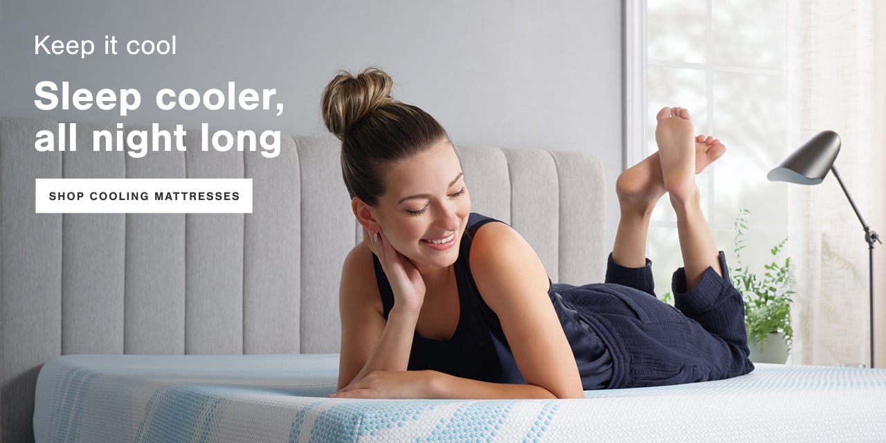 Ashley current mattress collection in a bedroom