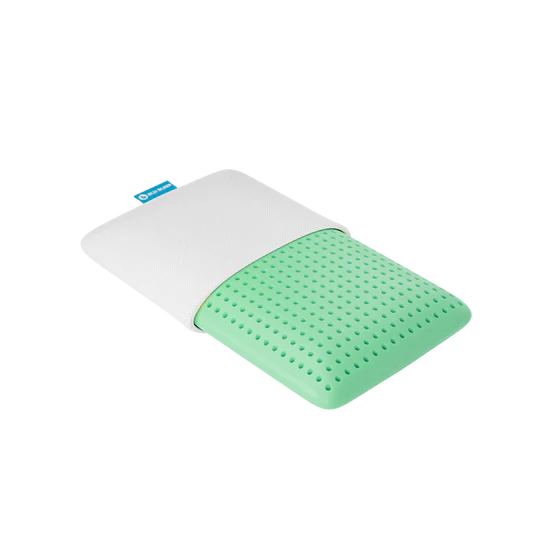 Bio Aloe pillow core in mint green with perforated texture, partially covered by white casing