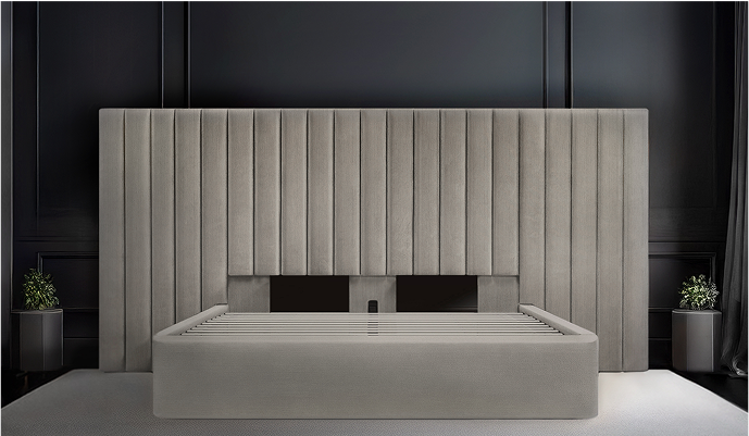 Light gray Milan bed with a tall fluted velvet headboard against dark paneling