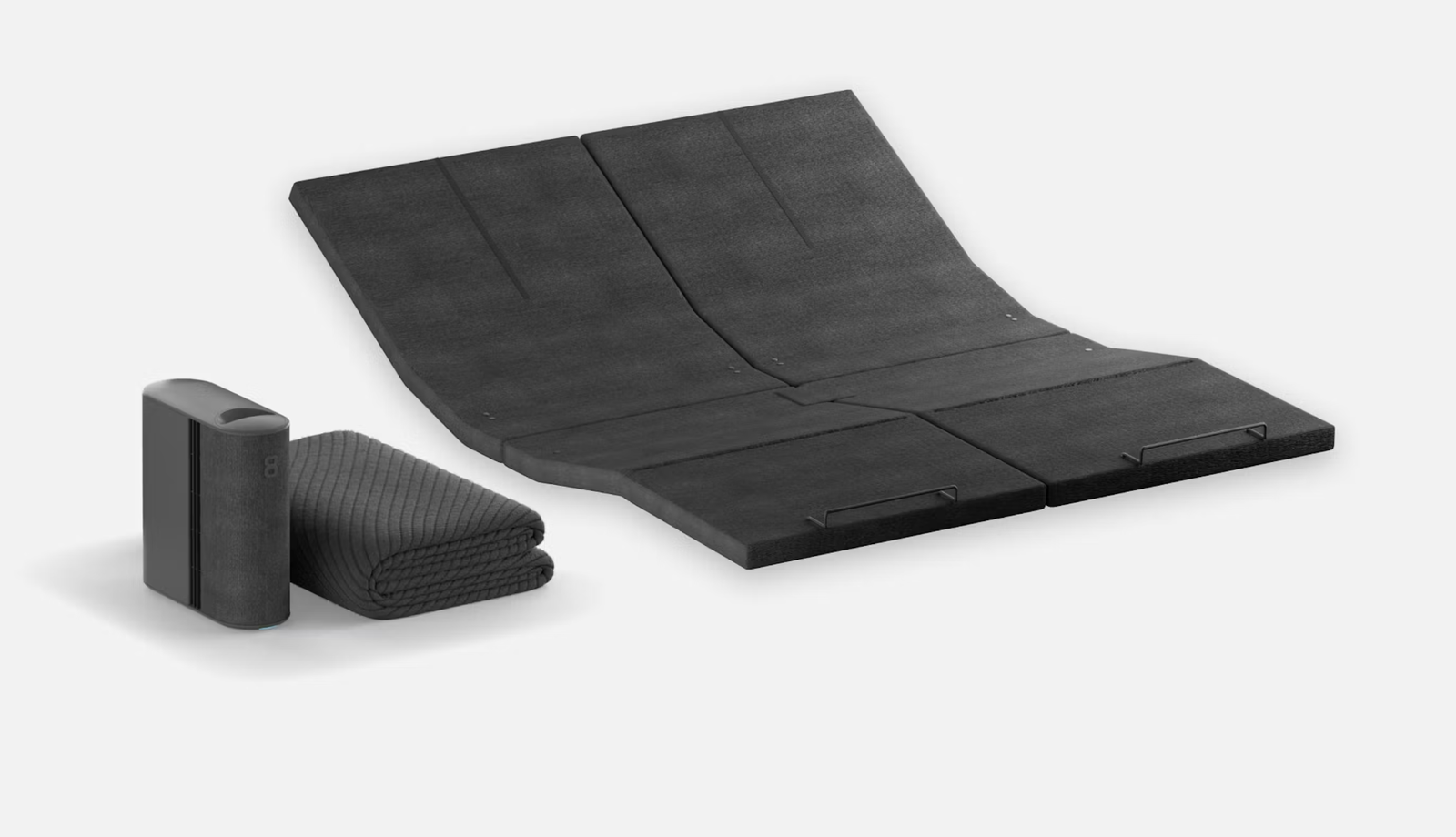 Eight Sleep Pod cover on a mattress with the bedside Hub