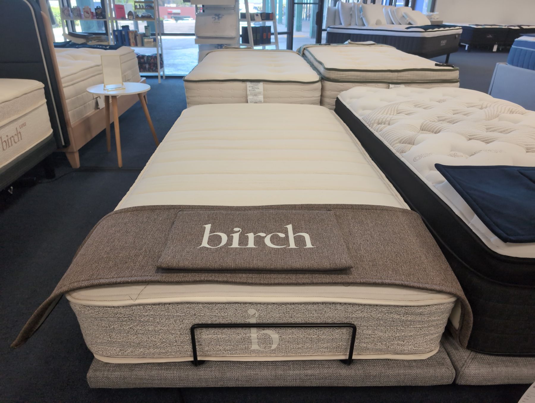 Birch Natural Featured photo — bare mattress on a base