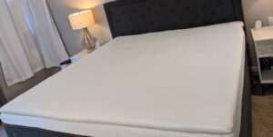 Perfectly Snug Smart Topper on a bed during Yawnder testing