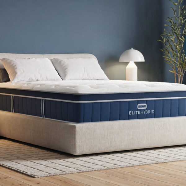 Bear Elite Hybrid mattress in bedroom with Good Housekeeping award badge