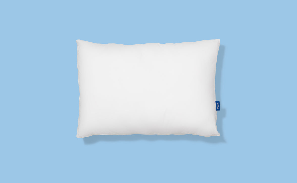Casper Original Pillow against a blue background