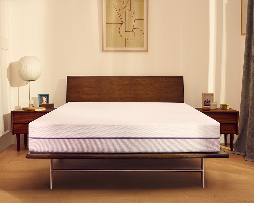 Official product photo of The Purple Mattress with its white cover and Purple branding