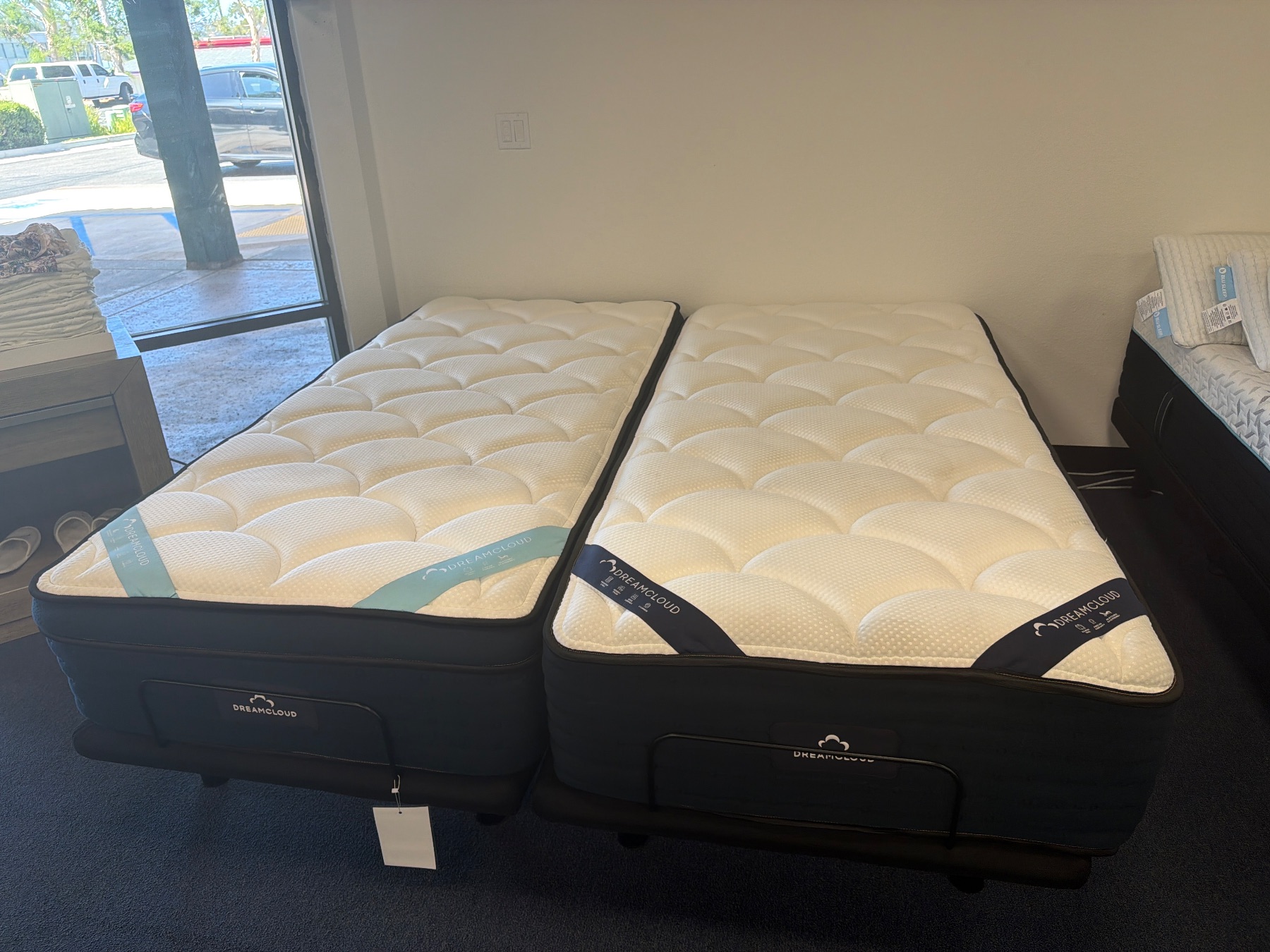 DreamCloud Mattress Featured photo — bare mattress on a base