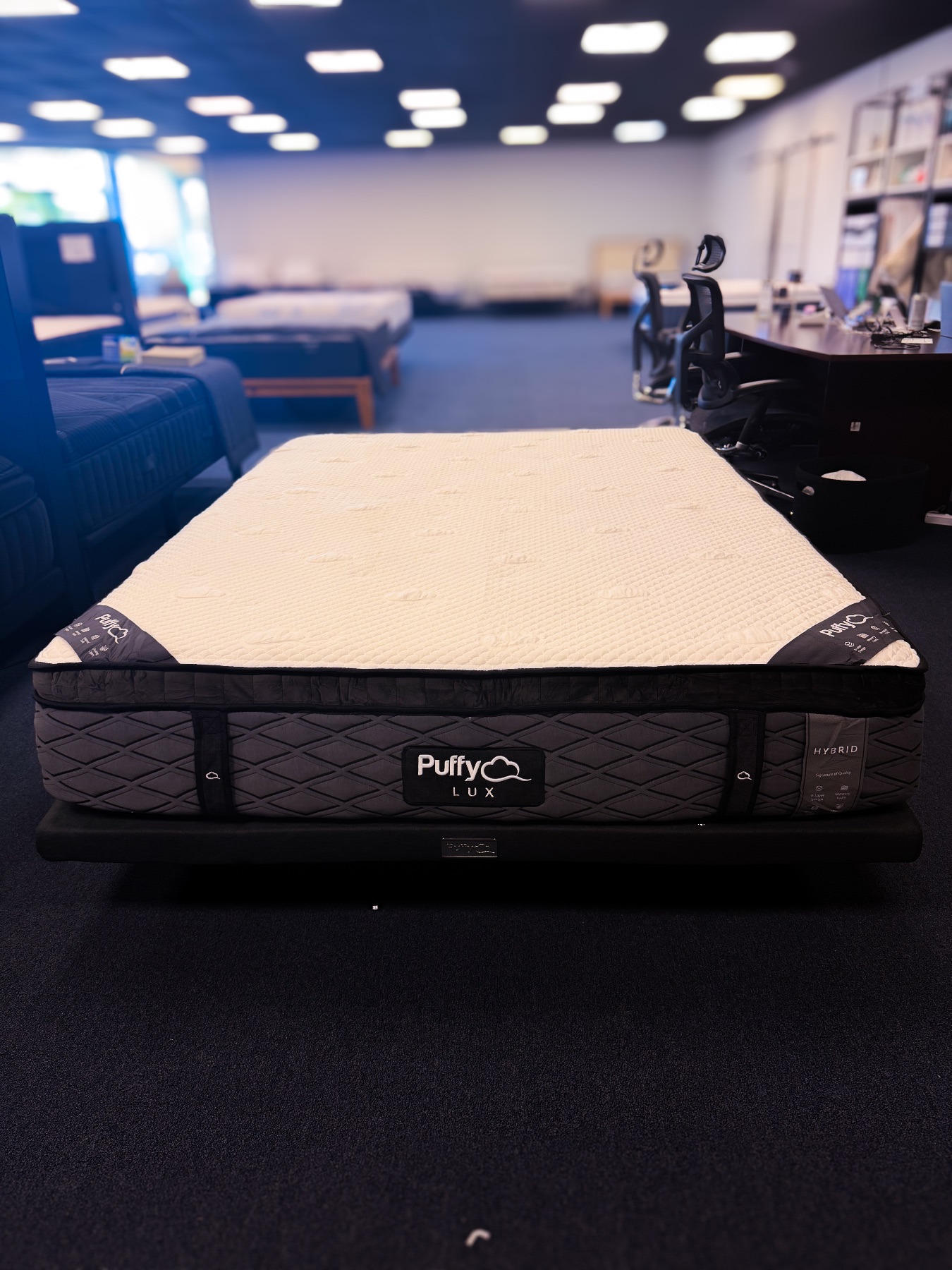 Puffy Puffy Lux Featured photo — bare mattress on a base