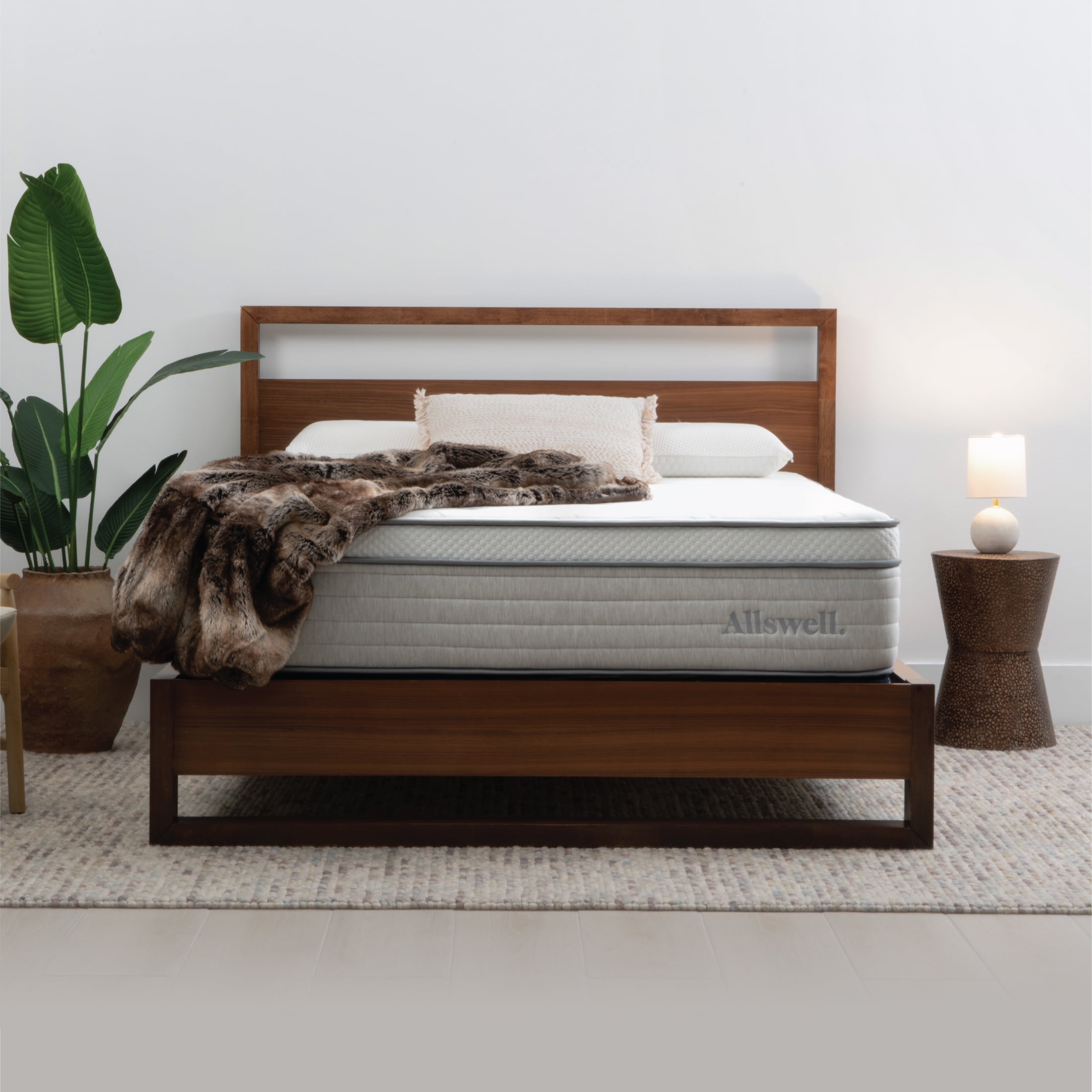 Allswell Supreme 14-inch mattress on a wooden platform bed