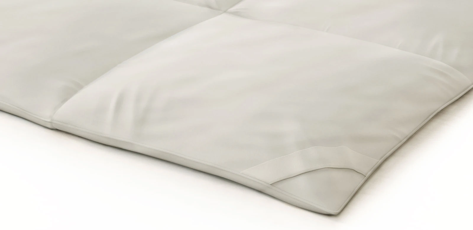 Close-up of Amerisleep Recover+ Comforter corner and stitching