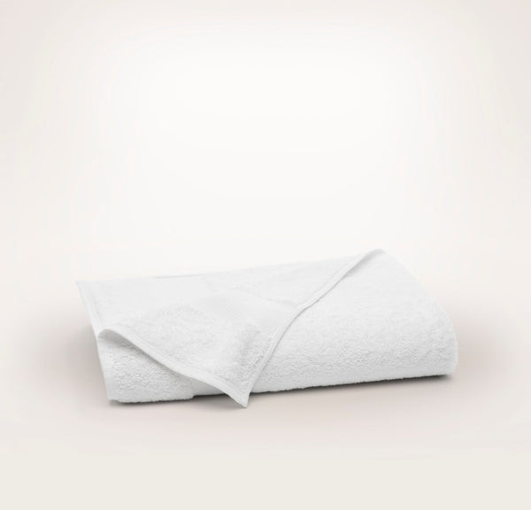 Folded white Boll and Branch Plush organic cotton bath towel