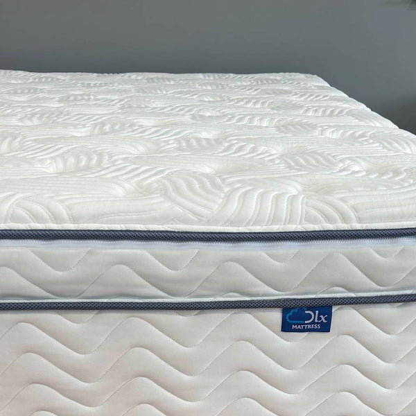 Official DLX Premier Hybrid mattress side profile showing quilted cover and edge