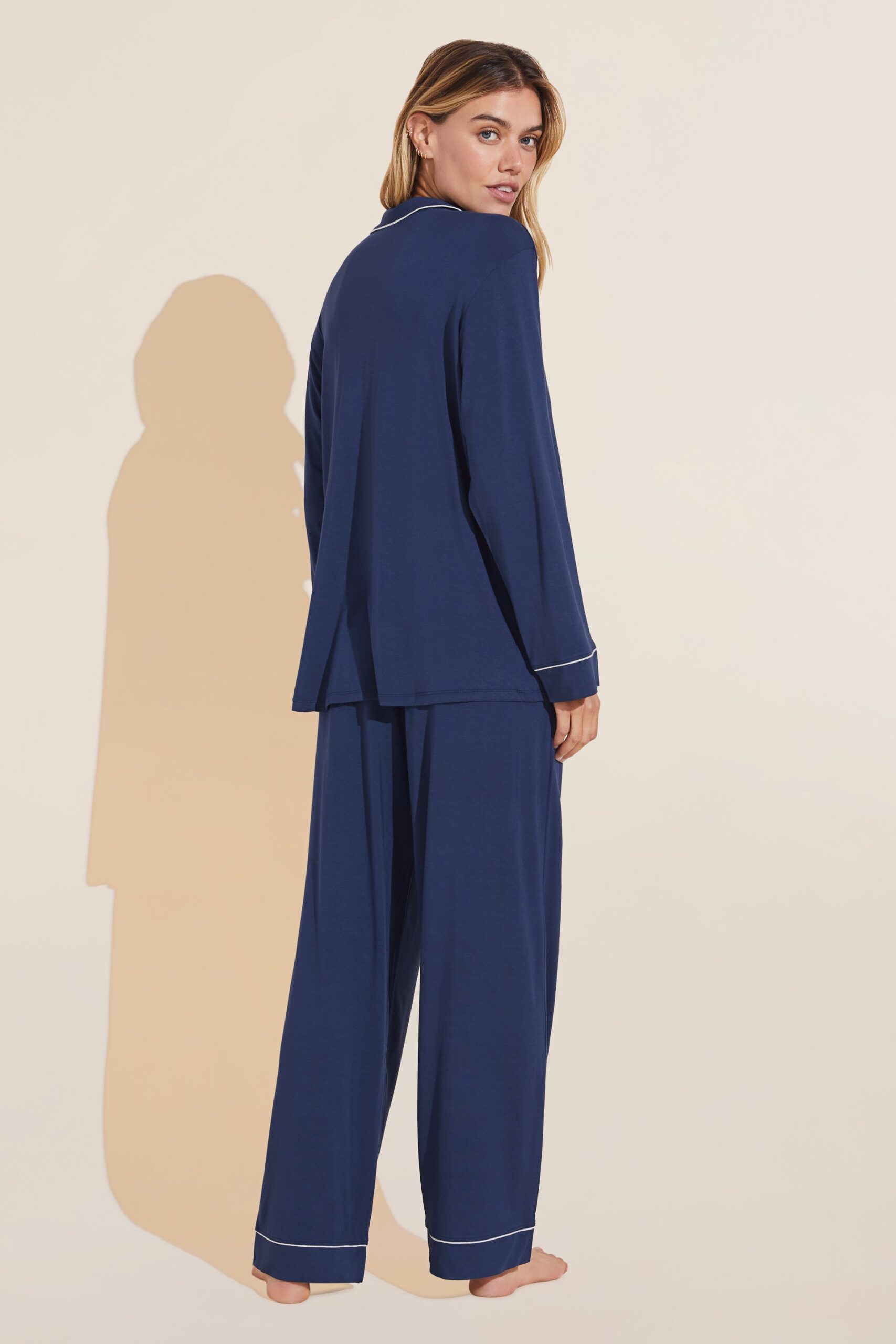 Back view of Eberjey Gisele navy long pajama set showing the drape of the top and straight-leg pants