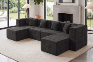 Dark grey Monvane U-Shaped Modular Couch with two chaise sections in a living room
