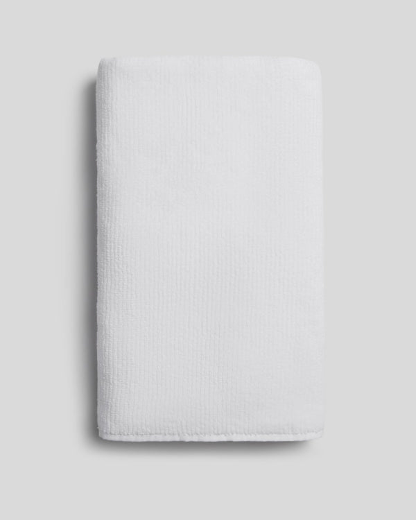 White Parachute Soft Rib bath towel folded to show its ribbed texture