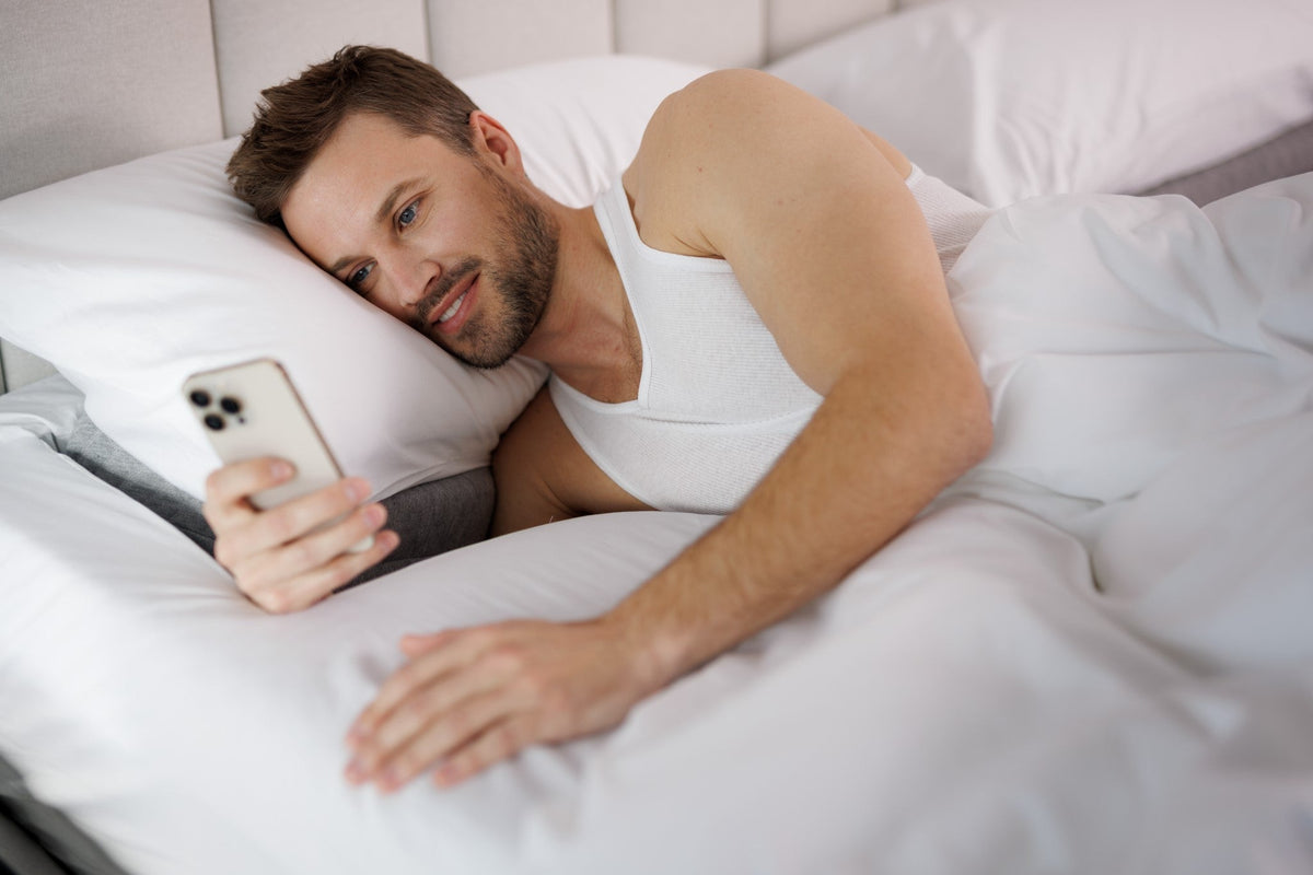 Person using SONU mattress and pillow arrangement in manufacturer photograph