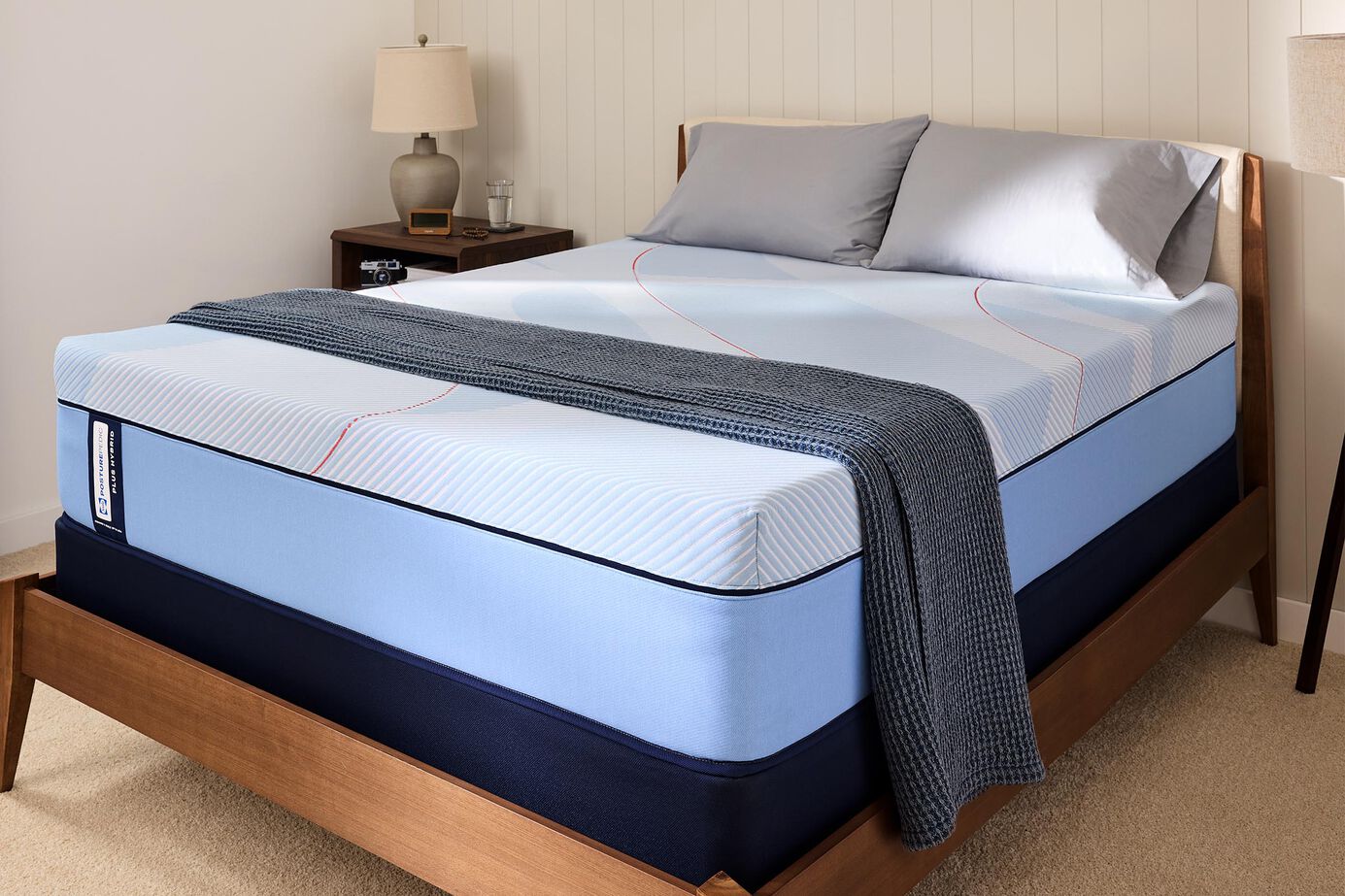 Sealy Posturepedic Plus Hybrid Paterson II Medium mattress in a bedroom