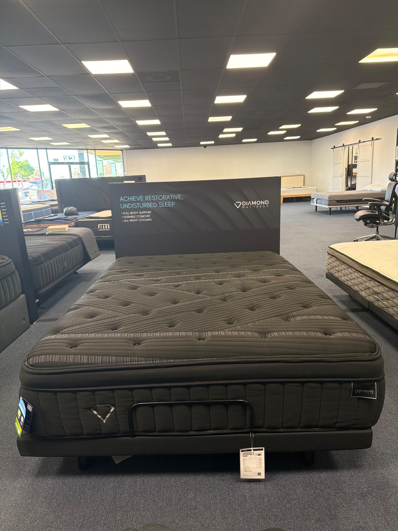 Diamond Black Diamond Lux Quilted Hybrid (Firm) Featured photo — bare mattress on a base