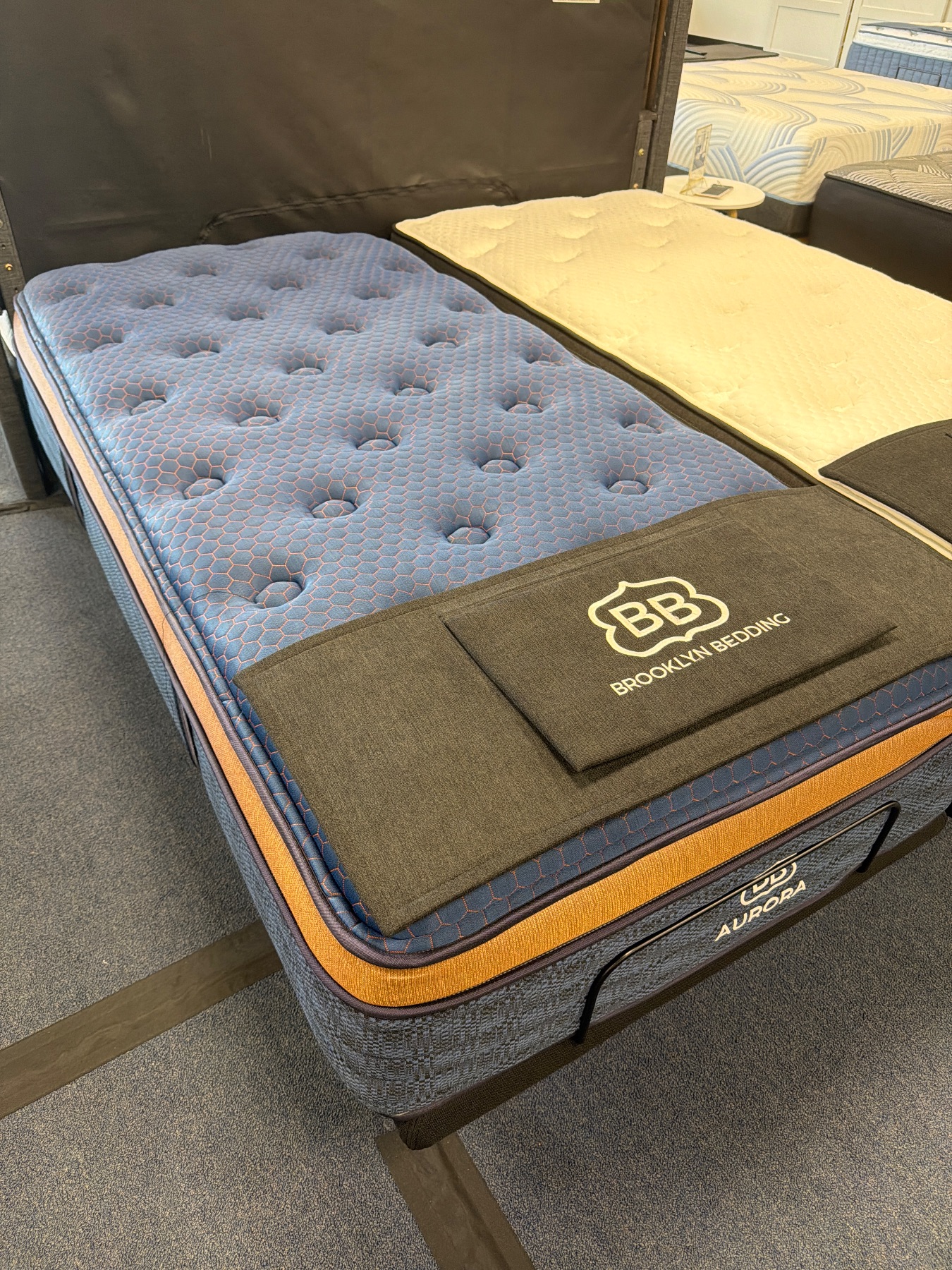 Brooklyn Bedding Aurora Luxe (Medium) Featured photo — bare mattress on a base